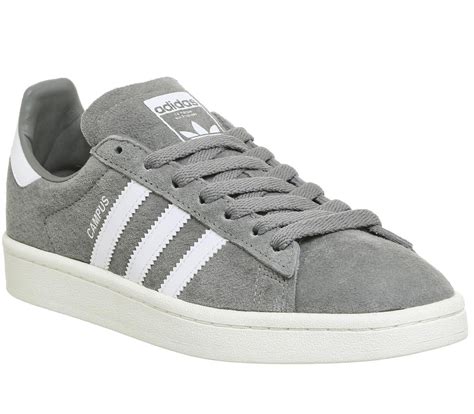 grey and white adidas shoes.